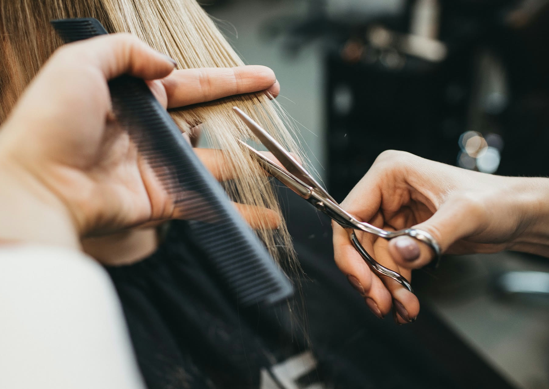 Precision haircut with shears and comb